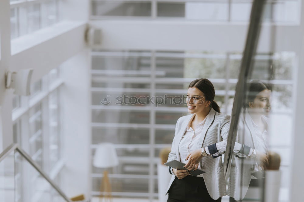 Similar – Stylish woman in jacket talking phone