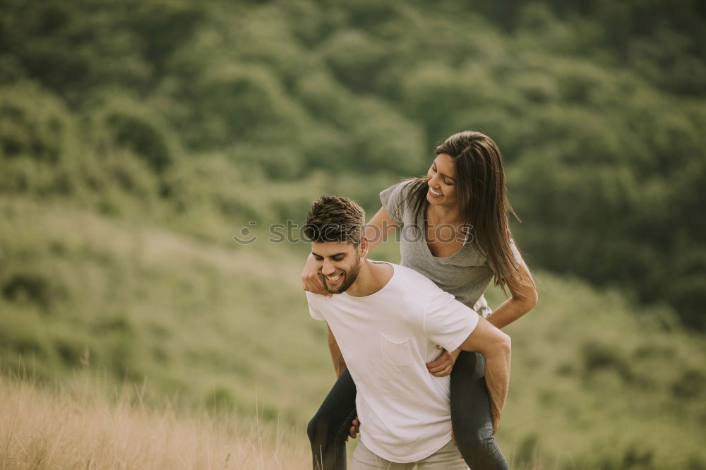 Similar – Image, Stock Photo Cool hipster couple embraced in nature