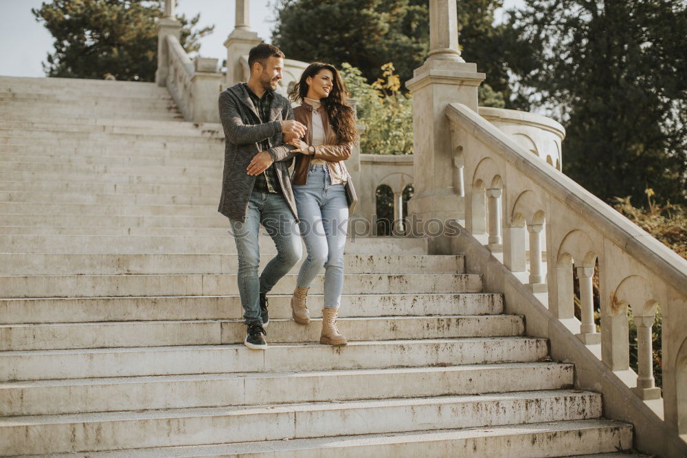 Similar – Image, Stock Photo Coupole holding hands standing on a road