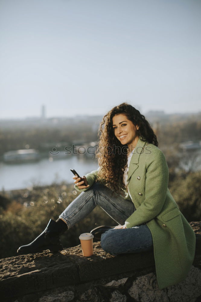 Similar – Image, Stock Photo Woman in red coat with mobile phone in hands, smartphone, urban scene