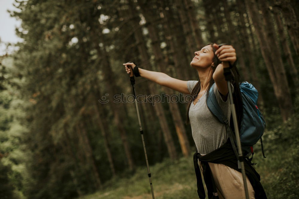 Similar – Image, Stock Photo Dreamy woman standing at fence on field