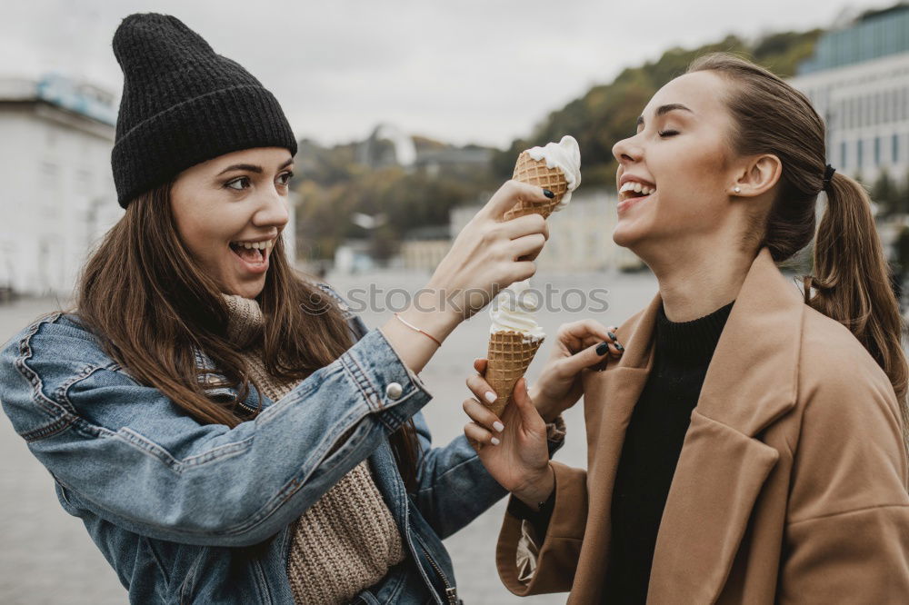 Similar – Women at lake in mountains