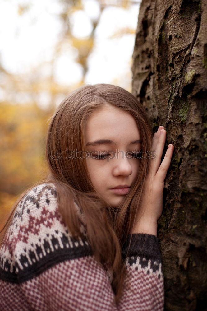 Similar – Portrait of a young slender woman in the forest