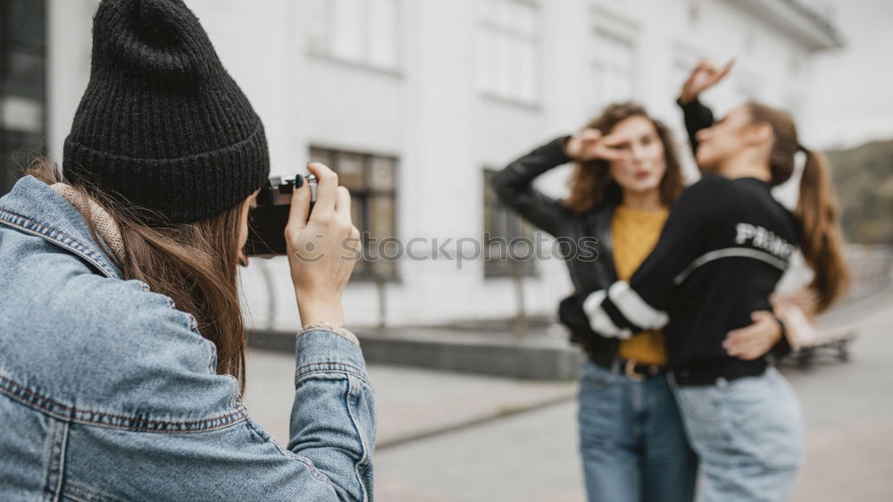 Similar – Young adult best friends cheering with confetti on party