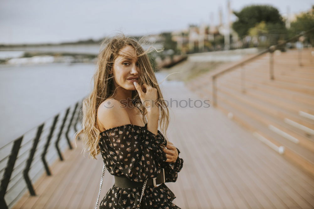 Similar – Image, Stock Photo Charming brunette on balcony in cityscape