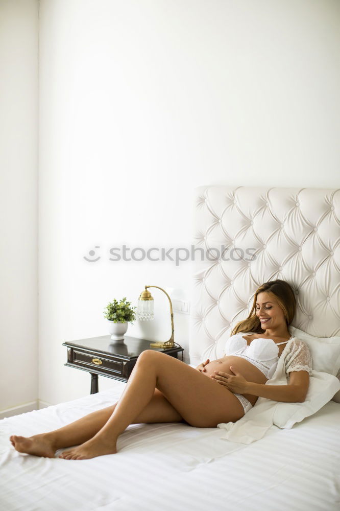 Similar – Image, Stock Photo Seductive woman lying on bed