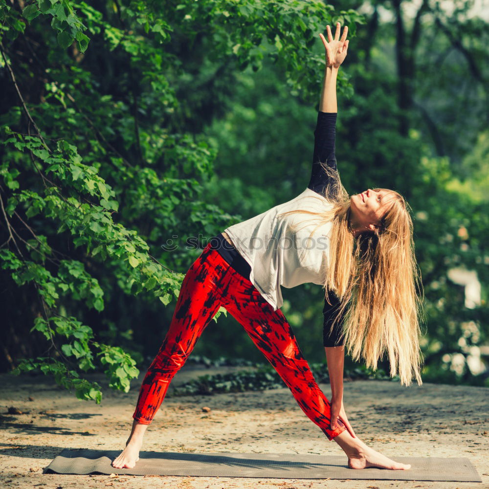 Similar – young woman doing yoga exercise outdoor