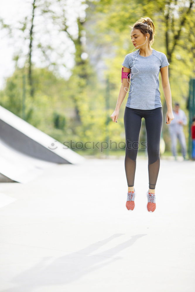 Similar – Image, Stock Photo Fitness woman doing skipping workout with jump rope