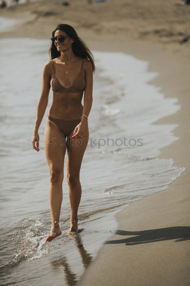 Similar – Image, Stock Photo Surfer girl on standing on the beach