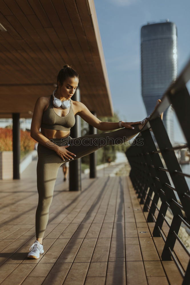 Similar – young woman runner having a rest outdoors