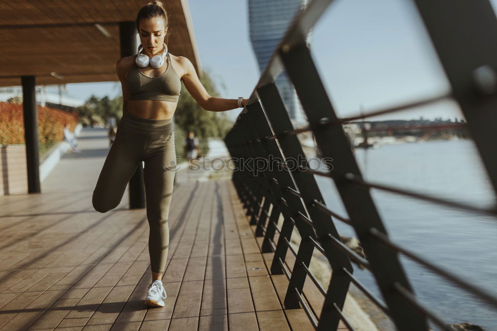 Similar – young woman runner having a rest outdoors