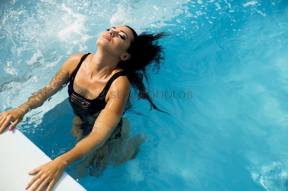 Similar – Image, Stock Photo Woman relaxing in swimming pool
