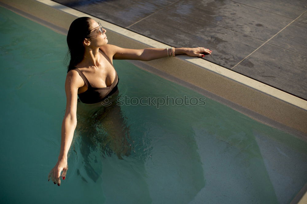 Similar – Image, Stock Photo Woman sunbathing and relaxing in Bikini on balcony