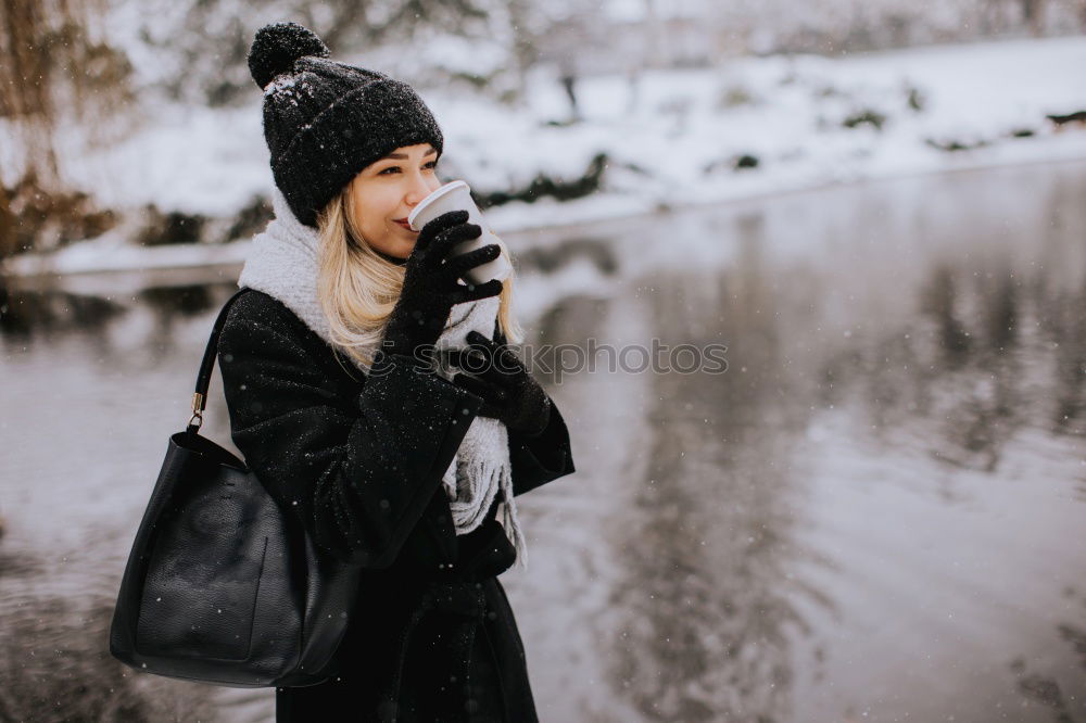 Similar – Image, Stock Photo Young black man is taking a walk outdoors in the winter