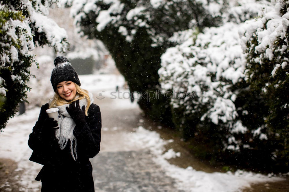 Similar – Image, Stock Photo Woman playing snowballs in woods