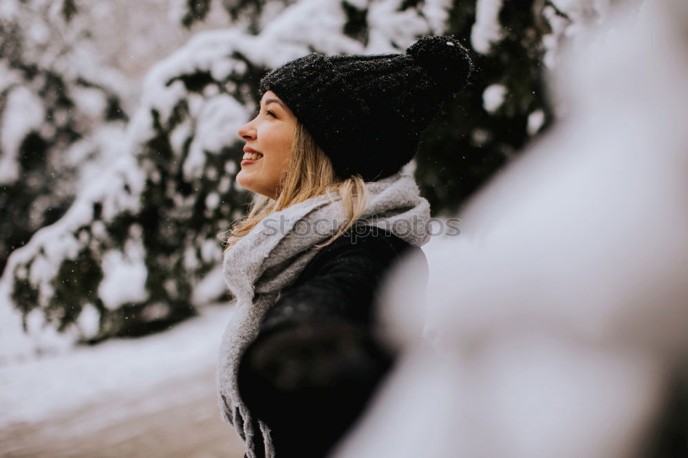 Similar – Image, Stock Photo Young black woman on the mobile phone near the royal palace in winter