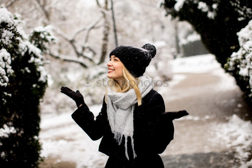 Similar – Beautiful blonde girl, walking through winter forest