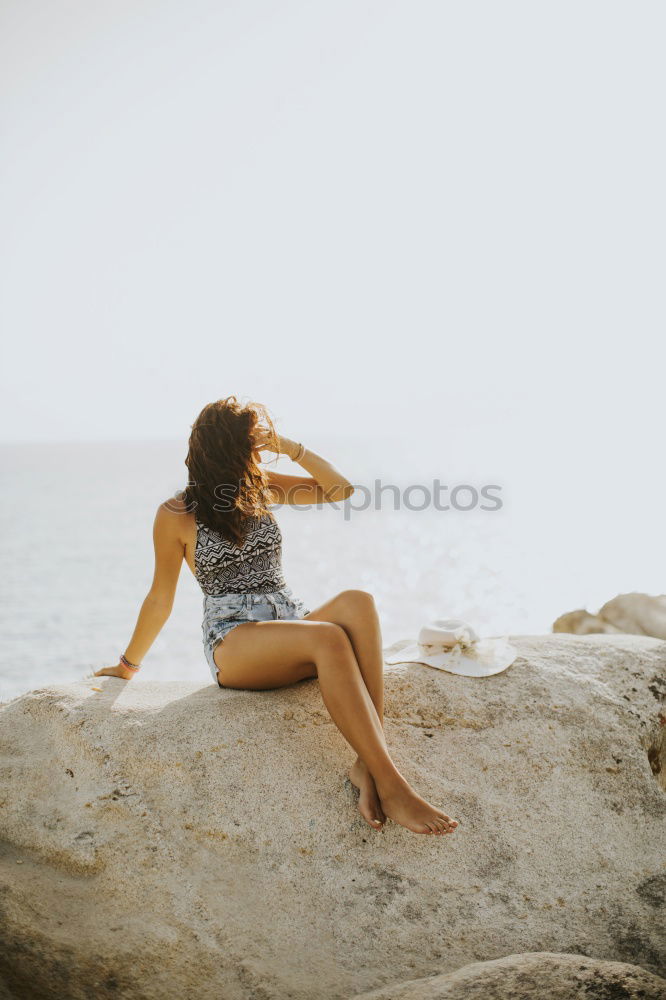 Similar – Image, Stock Photo Woman with orange swimsuit in pool