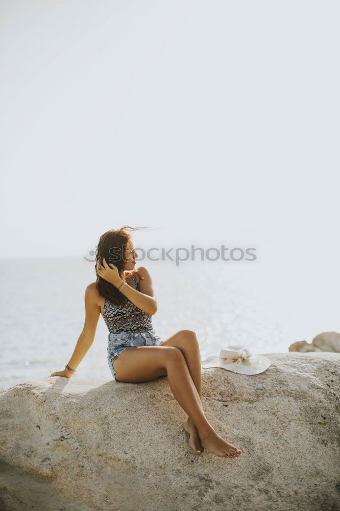 Similar – Image, Stock Photo Young naked woman holding man hand on shore near water