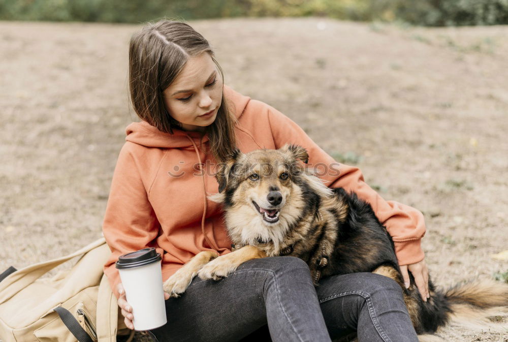 Similar – Happy smiling dog with its pretty young owner