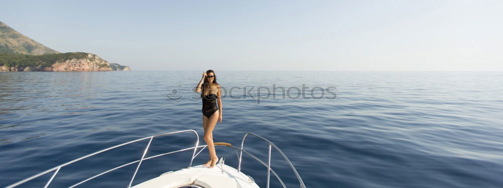 Similar – Image, Stock Photo Man in wetsuit swimming in ocean