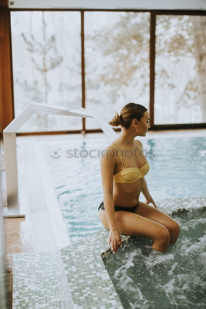 Similar – Beautiful young woman standing by the swimming pool