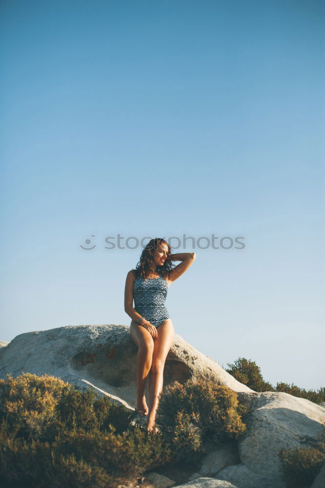 Similar – Girl Lying Down on a Bench at San Francisco, California