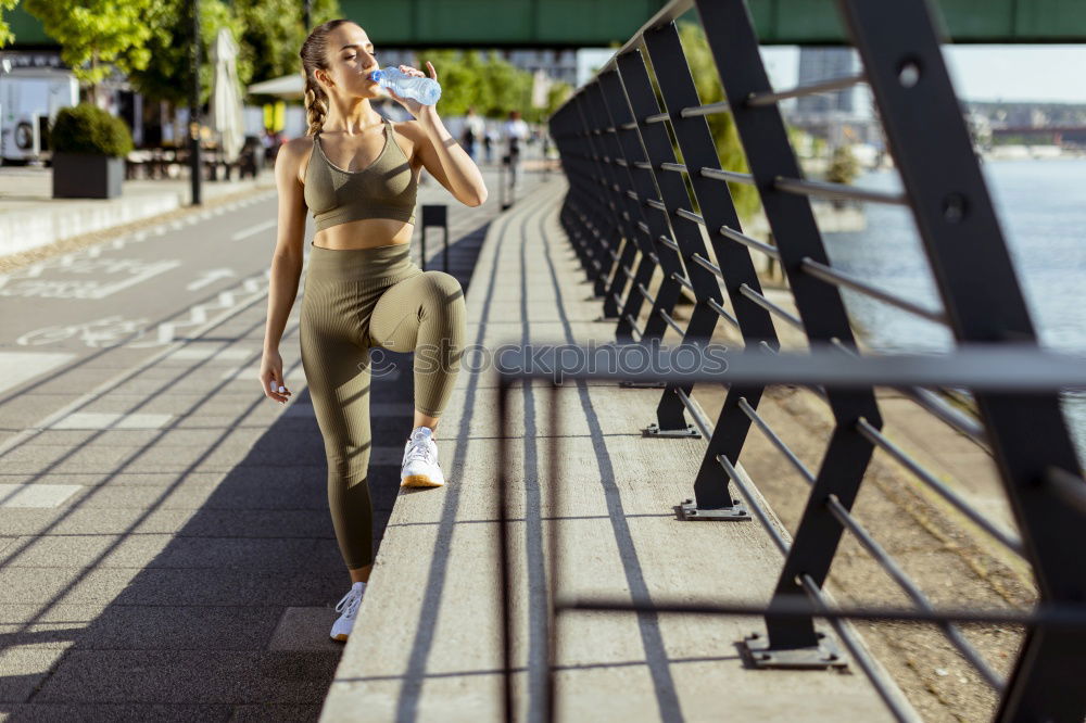 Similar – Fit smiling female adult resting after exhausting training