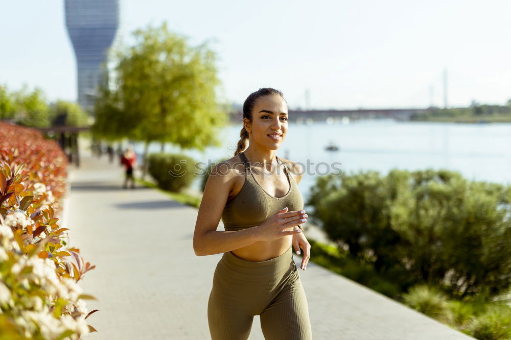 Similar – athletic woman eating an apple