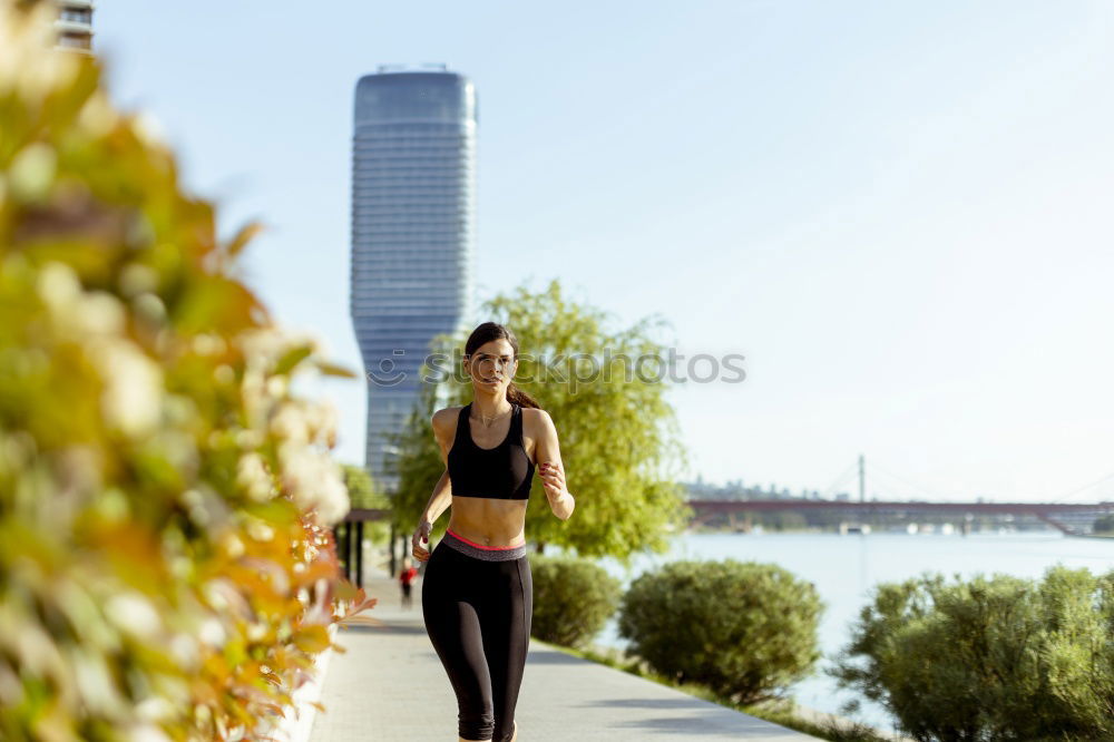 Similar – young woman runner having a rest outdoors