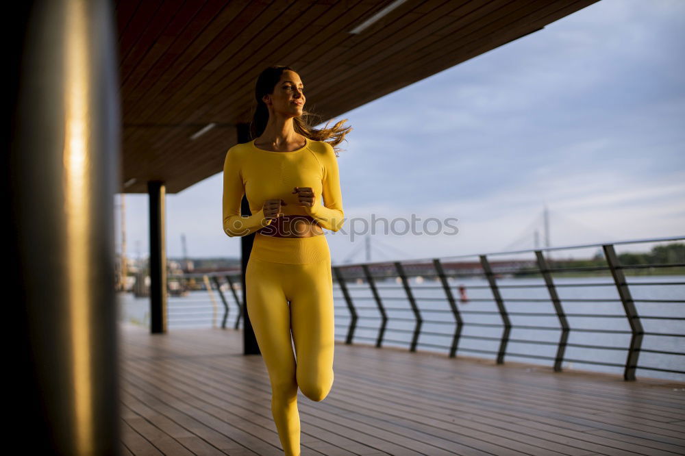 Similar – Image, Stock Photo Cheerful woman standing at handrail