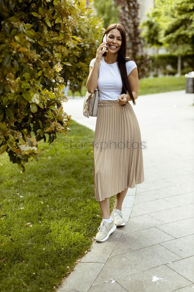 Similar – Young woman curly hairstyle with casual clothes in the street