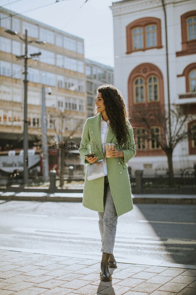 Similar – Image, Stock Photo Woman with afro hair walking through the streets
