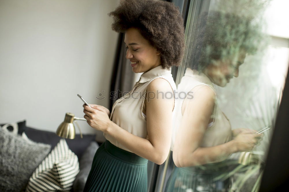 Similar – Woman smelling flower on market