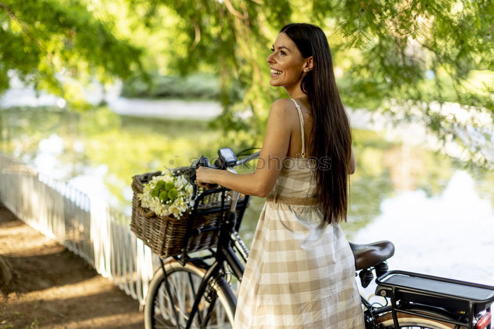 Similar – Image, Stock Photo Black young woman riding a vintage bicycle