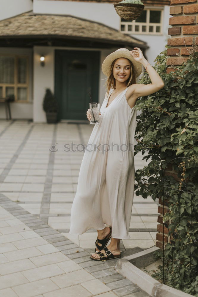 Similar – Image, Stock Photo Smiling blonde girl wearing dress dancing outdoors.