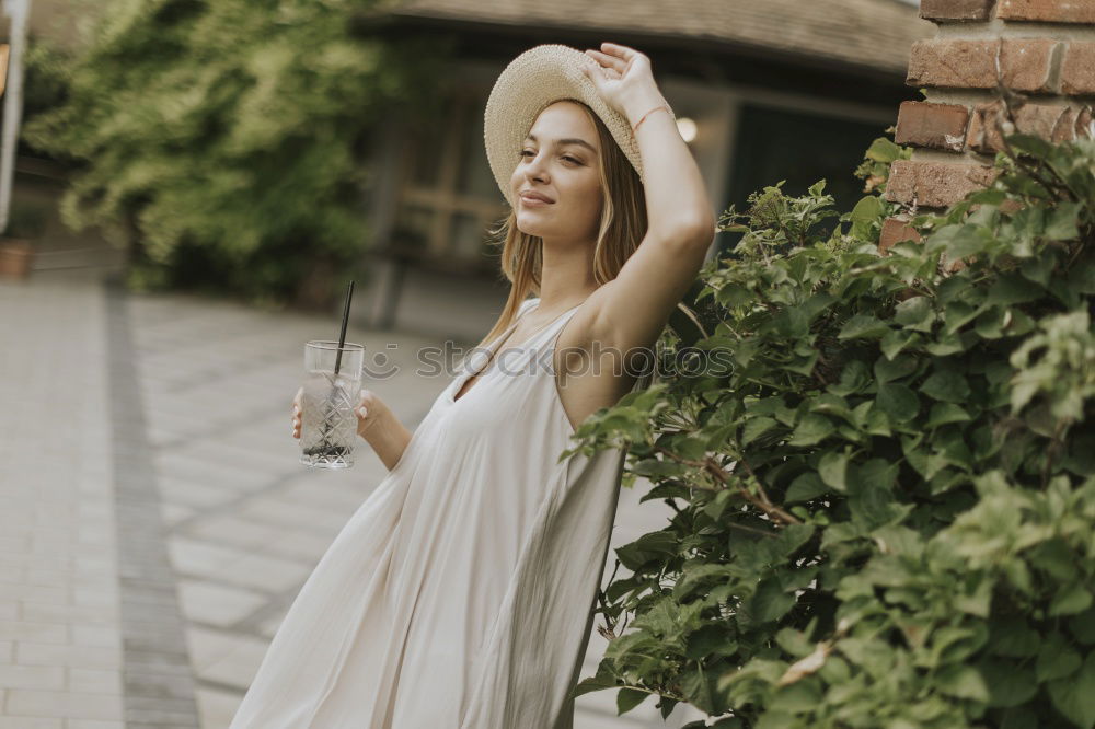 Similar – Image, Stock Photo Smiling blonde girl wearing dress dancing outdoors.