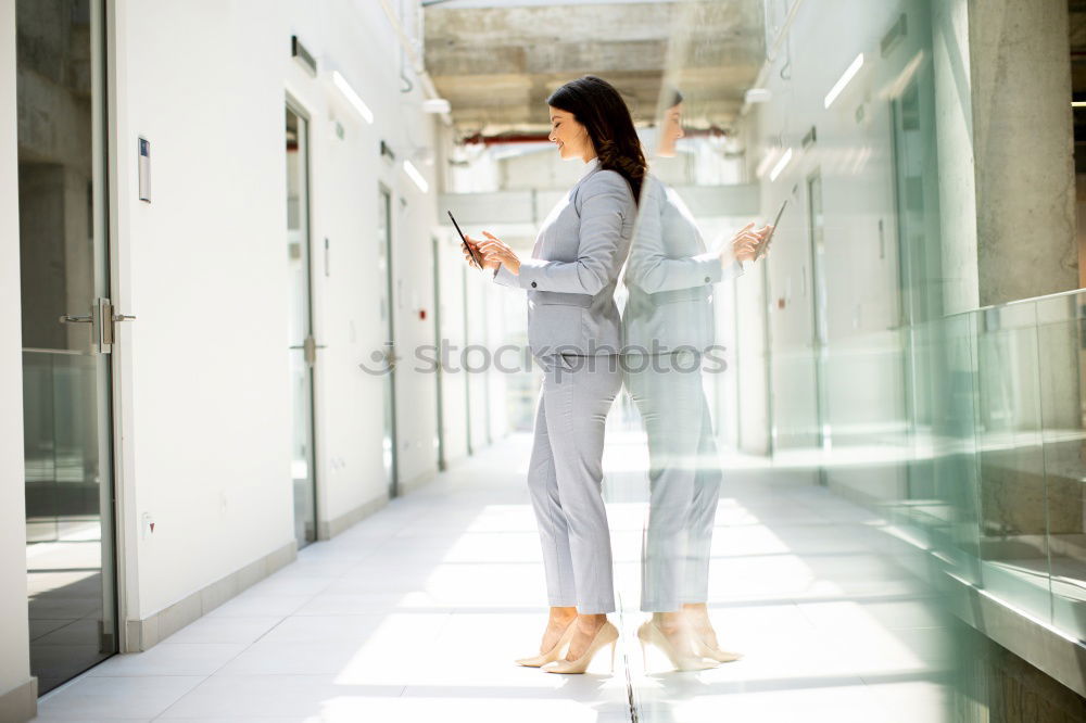 Similar – Stylish woman in jacket talking phone