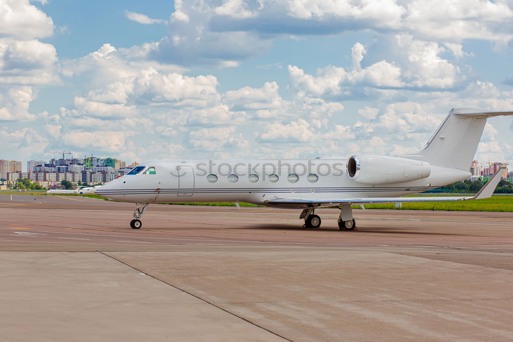 Similar – Image, Stock Photo Private luxury jet at the airport terminal