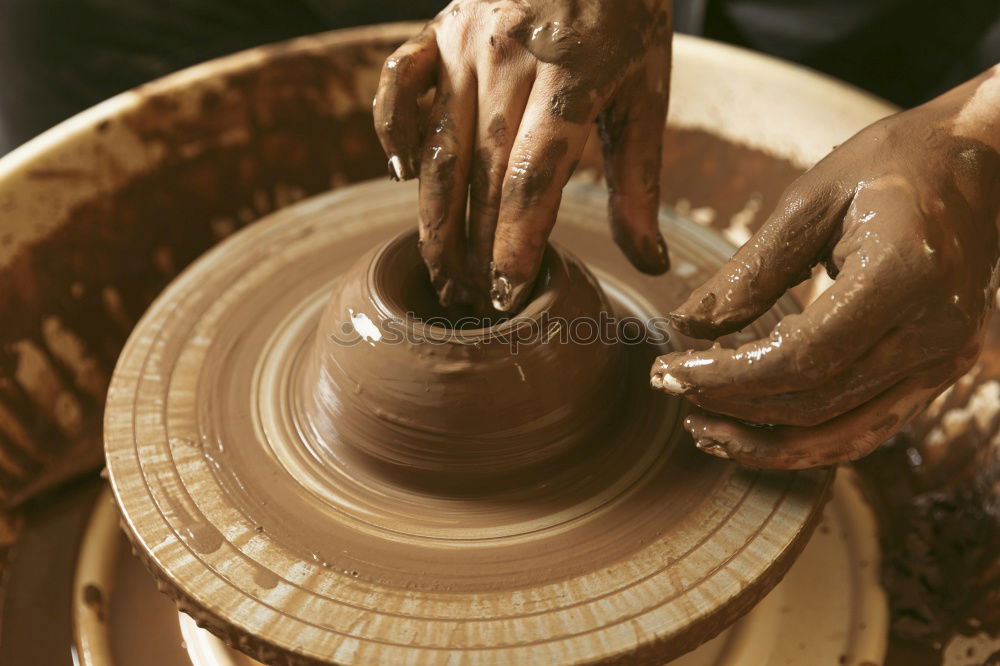Similar – Image, Stock Photo Hands of a potter forming clay