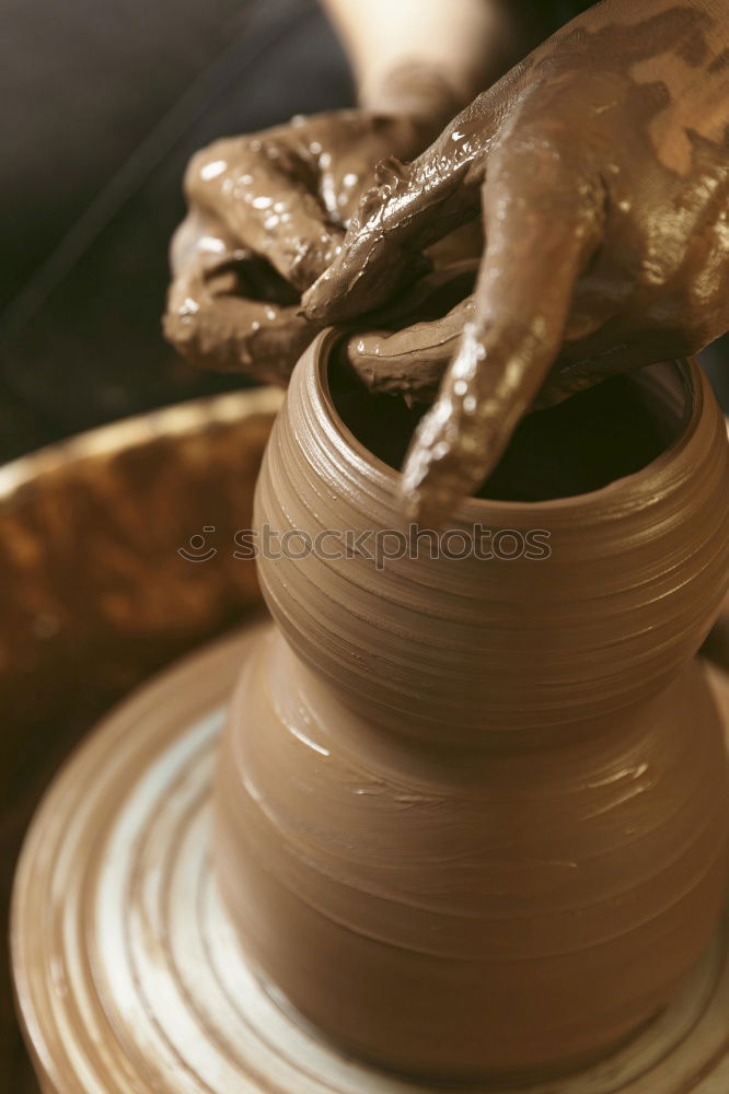 Similar – Image, Stock Photo Close-up of clay vase on wheel