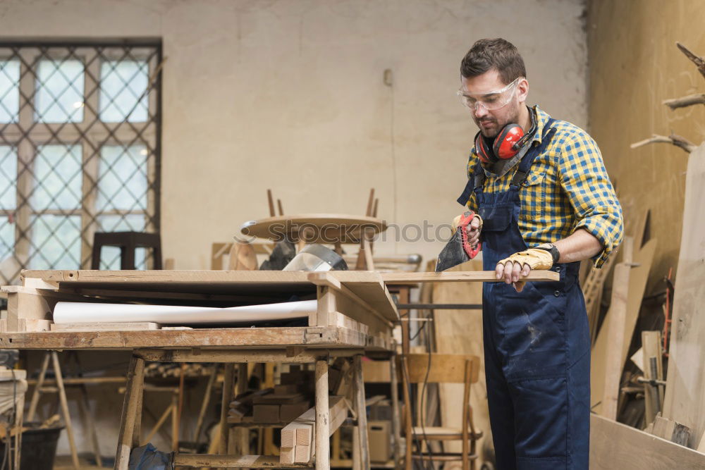 Similar – Portrait of senior carpenter.