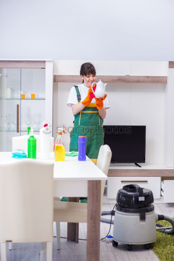 Similar – Image, Stock Photo Woman in work wear in her workshop by table with handmade items