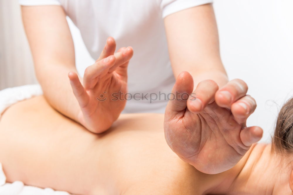 Similar – Image, Stock Photo Woman receiving massage on shoulders in clinical center