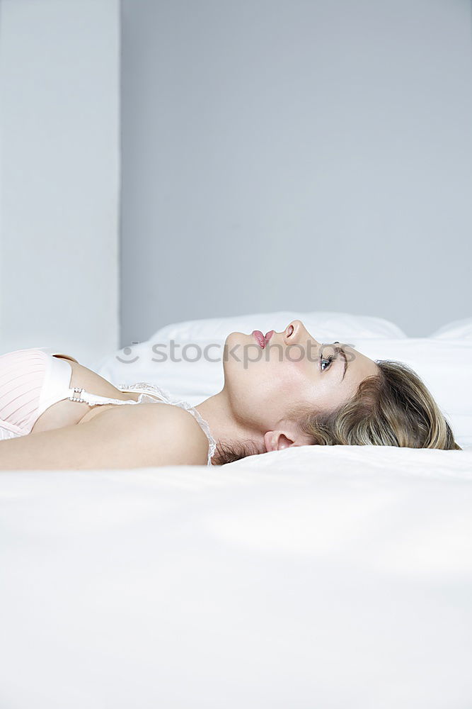 Similar – Image, Stock Photo Blonde woman lying in bed