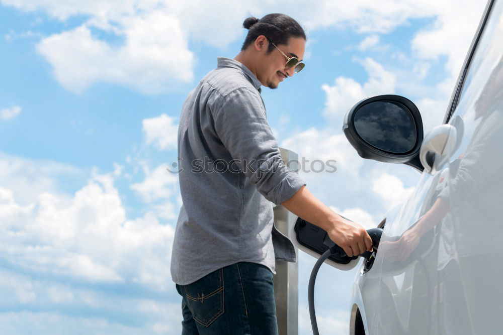 Similar – Image, Stock Photo Man worker washing car with sponge