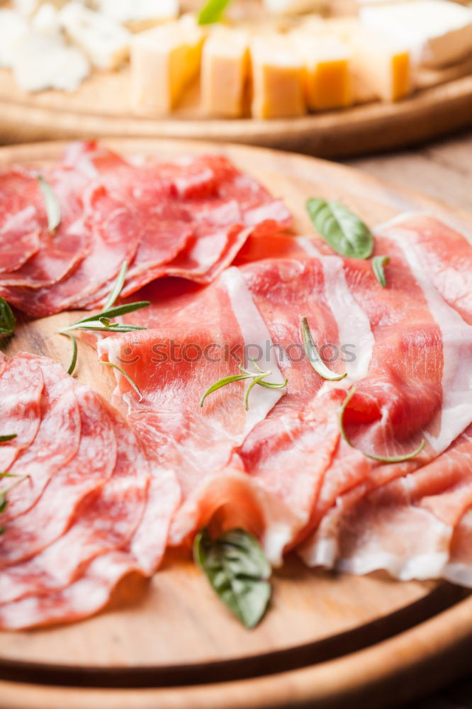 Similar – Image, Stock Photo Bruschetta with Italian sausage, ham and pesto