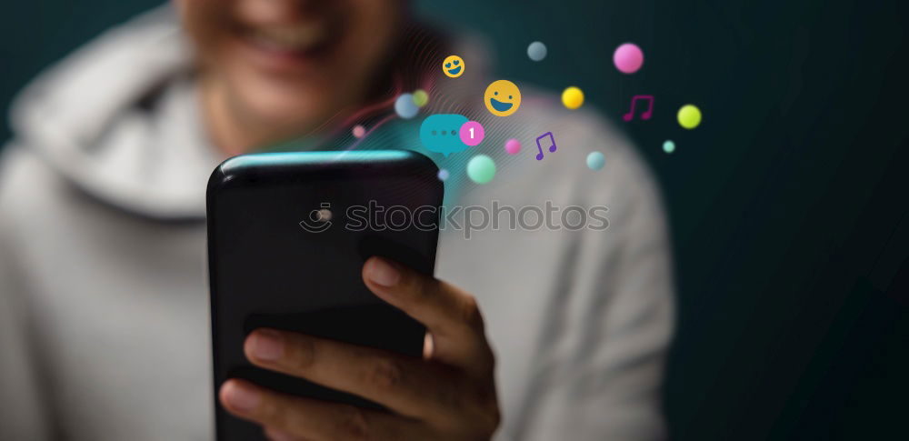 Similar – Image, Stock Photo teenager sits at the breakfast table wrapped in a blanket and looks into her smartphone