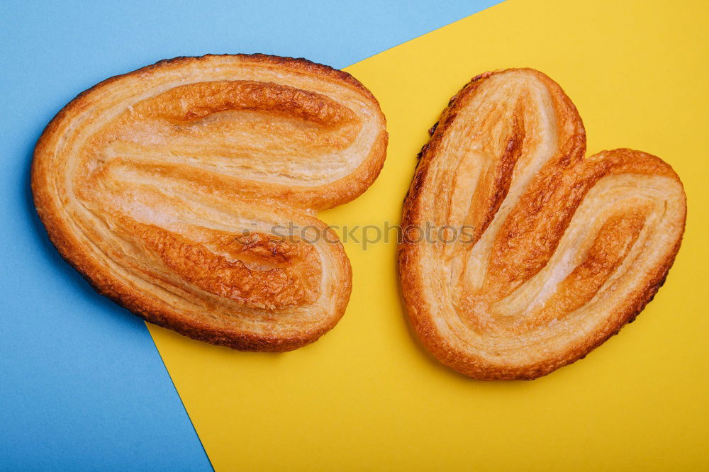 Similar – Image, Stock Photo Three different rolls on a red background