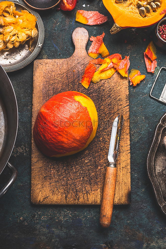 Similar – Image, Stock Photo Pieces of pumpkin in salt and pepper